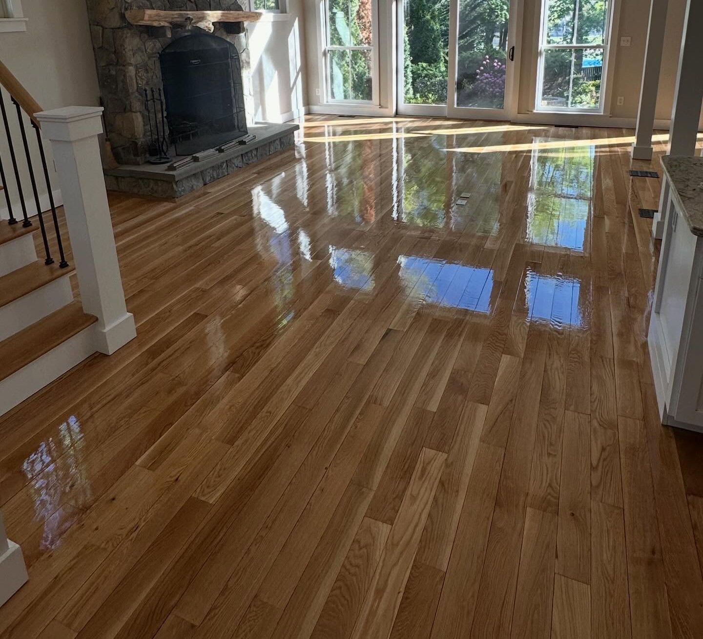 Flooring services showcase — kitchen and living areas in Connecticut